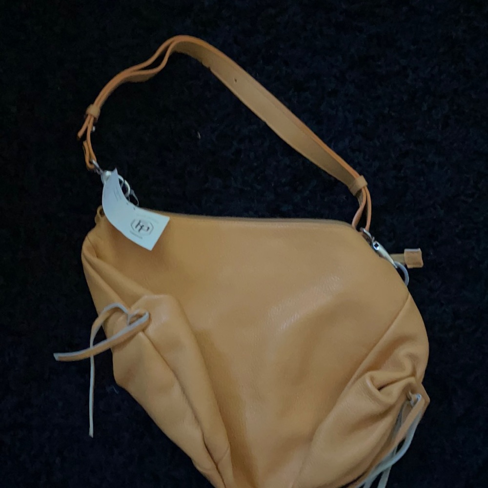 Mustard yellow bag perfect new condition with tag